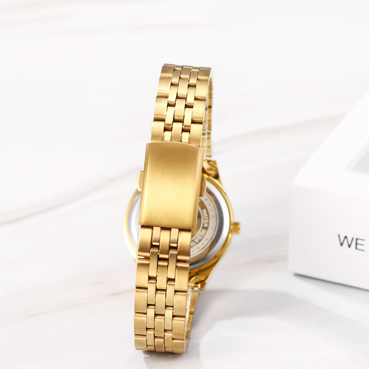 Rhinestone day-date watch — back and clasp